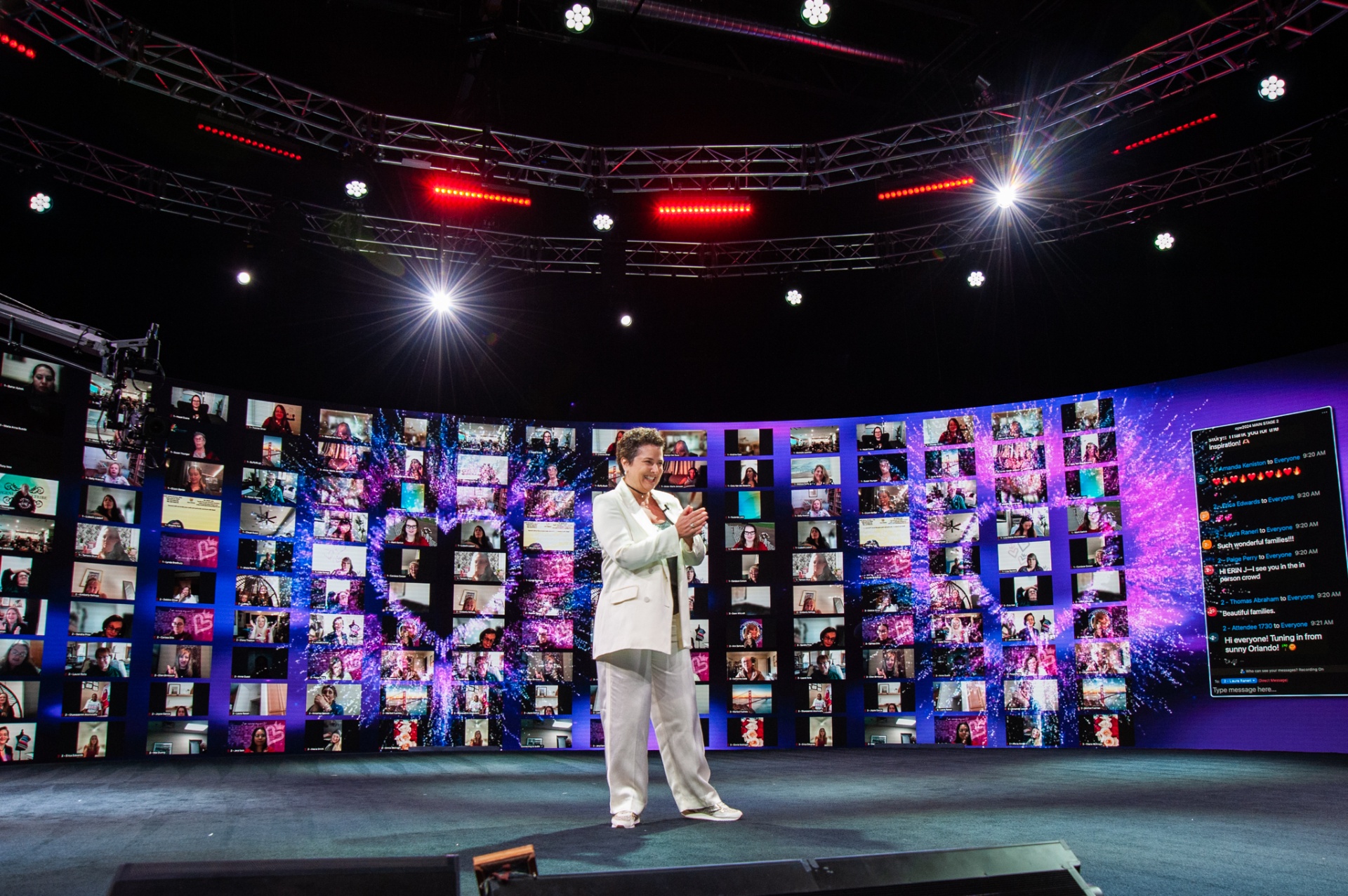 Josselyne Herman-Saccio on stage speaking to a global audience